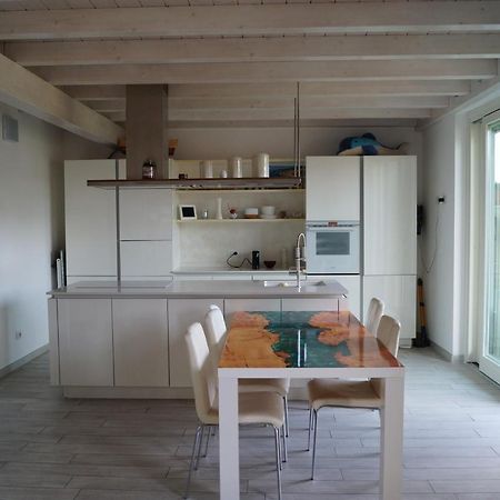 Charme Lake Loft Ispra Bagian luar foto
